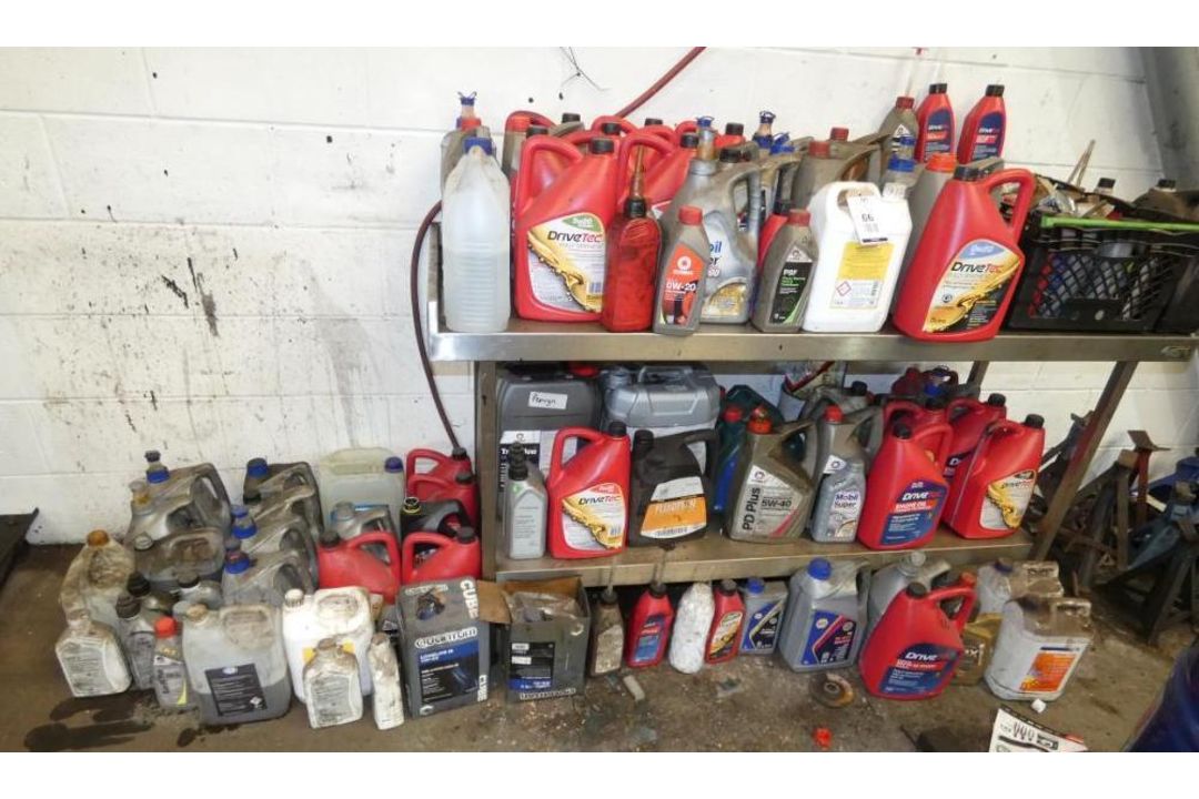 Stainless Steel Bench & Contents of Assorted Engine Oils (Most Quarter/Half Full) (Location: Penryn. - Image 1 of 3