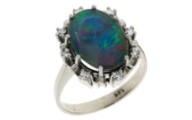 Ring 4,88g 585/- Weißgold mit 8 Diamanten zus. ca. 0,12 ct. F/vs und Opal, Ringgröße ca. 51