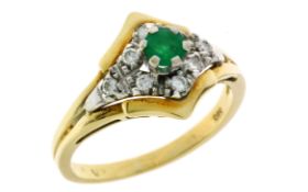 Ring 4,13g 585/- Gelbgold und Weißgold mit 8 Diamanten zus. ca. 0,16 ct. und Smaragd, Ringgröße c...