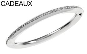 Caudeaux Armreif 50,63g 750/- Weißgold mit ca. 60 Diamanten zus. ca. 0,60 ct.