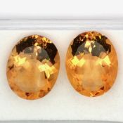 Citrin Paar Oval 51.99 ct.. Laenge ca. 23.15 mm. Breite ca. 18.11 mm. Hoehe ca.11.01 mm