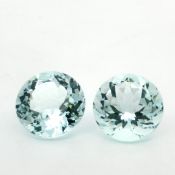 Aquamarin Paar rund 17.96 ct.. Breite ca. 14 mm. Hoehe ca. 8.86 mm