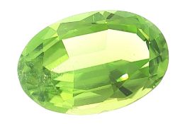 Peridot zu 13.83 ct.. Laenge 18.89 mm. Breite 12.75 mm. Hoehe 7.94 mm mit Zertifikat