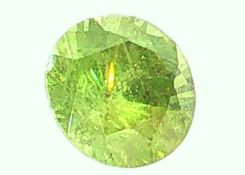 Demantoid 1.10 ct.. Laenge 6.07 mm. Hoehe 4.41 mm mit Zertifikat