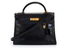 Hermès, sac Kelly 32 Retourné en box noir, année 1992, tirette, clochette, 2 clefs, cadenas, bandoul