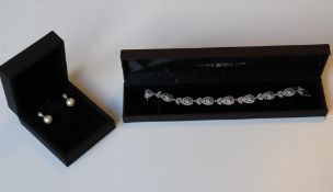 Stephanie Browne, collection Eternity, lot composé d'un bracelet "Diadème" et d'une paire de boucles