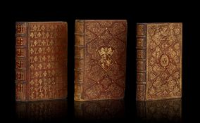 \[OFFICE\]. 3 ouvrages in-8° des XVIIe et XVIIIe s. en reliure d'époque aux plats ornés de symboles