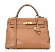 Hermès, sac Kelly 32 retourné en cuir vachette naturel, année 1993, tirette et clochette avec 2 clef