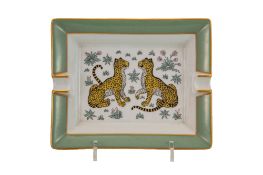 HERMÈS. Vide-poche cendrier en porcelaine, Paris, XXe s., motif léopard, 19,5x16 cm