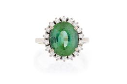 Bague or gris 750 sertie d'une tourmaline verte ovale entourée de diamants taille brillant, doigt 57