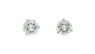 Paire de clous d'oreilles or gris 750 sertis de 2 diamants taille brillant (env. 0.60 ct chacun)