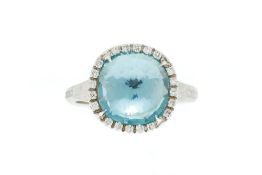 Marco Bicego, bague or 750 texturé sertie foilback d'une topaze facettée entourée de diamants taille