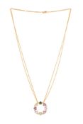 Bucherer, pendentif circulaire en or rose 750 serti de saphirs de couleur taillés en cœur alternés d