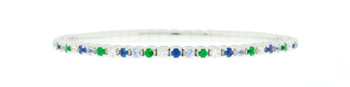 Piero Milano, bracelet extensible or gris 750 serti de saphirs, de tsavorites et de diamants taille