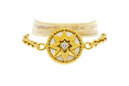 Dior, Rose des vents, bague en or 750 ornée d'une pastille de nacre surmontée d'un diamant taille br