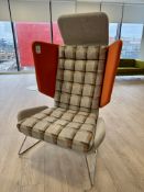 Contemporary upholstered breakout winged Armchair, with chrome legs, orange (location in building: