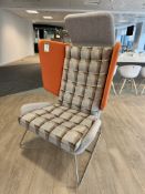 Contemporary upholstered breakout winged Armchair, with chrome legs, orange (location in building: