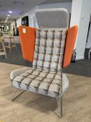 Contemporary upholstered breakout winged Armchair, with chrome legs, orange (location in building: