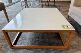 Wood framed Perspex top Coffee Table (location in building: sixth floor room explorer)
