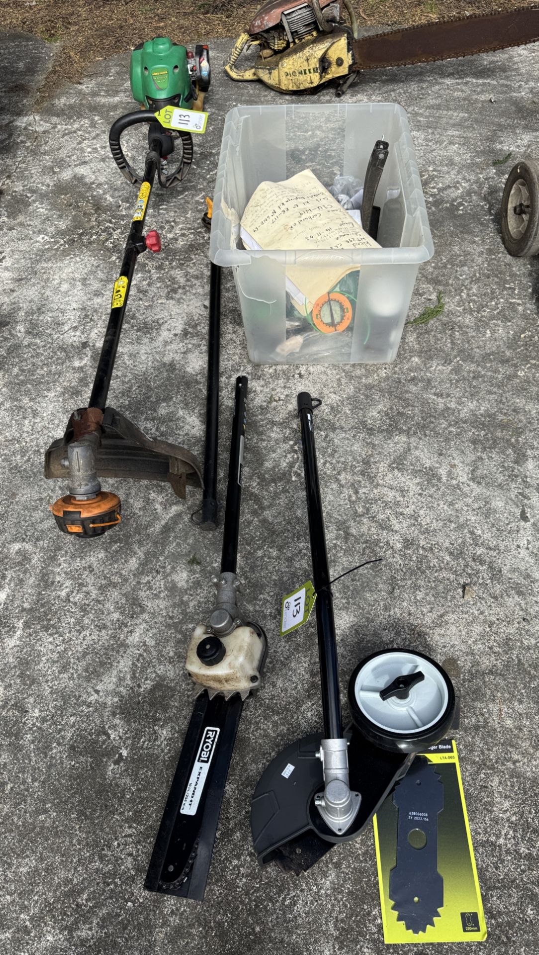 Husqvarna WT255CLS petrol Brush Cutter with interchangeable edge cutter and chain saw attachments,