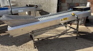 Peter Cox stainless steel Incline plastic Roller Conveyor, 590mm roller width, 3000mm long, 1100mm