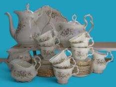 A Royal Albert Haworth pattern part tea and coffee service, including coffee pot, teapot, covered
