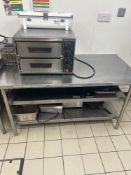 Stainless steel table with under shelf 140cm x 70cm x 77cm Note this lot has a lift out charge see