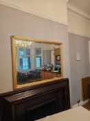 Overmantle wall mirror with gold-painted wooden frame. Ribbed moulding with stepped inner edge and