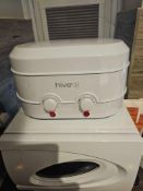 Hive dual wax heater with twin heating chambers, each fitted with rotary temperature control dials