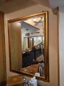 A bevelled accent mirror in gold profile frame 106 x 135cm [Loc Conference Lobby] A lift out