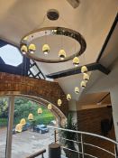 Modern chandelier pendant featuring a circular ceiling plate with 16 suspended LED droplights in