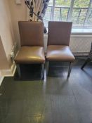 Set of six upholstered dining armchairs with high backs and fixed seat pads Finished in brown
