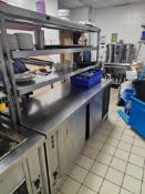 Stainless steel chef's pass with integrated hot cupboard base and overhead gantry. Features heated