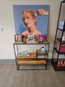Asymmetrical bookcase or display étagère featuring a sculptural open-shelf design with staggered