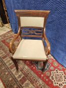 English Regency Style Carved And Inlaid Back Splat Armchair Upholstered And Raised On Sabre Legs