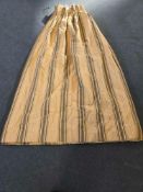 A Pair Lined Pencil Pleat Top Of Striped Drapes Fabric Is A Warm, Golden-Tan Or Mustard Yellow