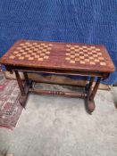 A antique-style wooden games table is a versatile and decorative statement piece, perfect for a