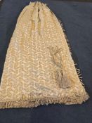 A Pair Lined Pencil Pleat Top Of Patterned Drapes Crafted On A Light Cream Or Off-White Base,