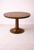 Decca Circular Pedestal Table – Zebrano Veneer (Piece 1) A circular pedestal table by Decca,