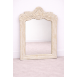 A large rectangular accent mirror featuring a broad, off-white painted frame with a distressed