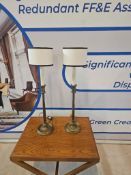 Pair of Antique Brass Candlestick Table Lamps: A pair of table lamps in a traditional antique