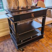 Oak Ebony Drinks Trolley: A three tier oak ebony wood drinks trolley with a single drawer and a
