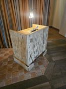 Bespoke reception counter is a landmark of regenerative design, born from a high-profile