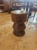 Bishop Stool This Bishop Stool offers practicality as a seat or an innovative side table. Styled