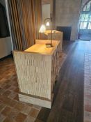 Bespoke reception counter is a landmark of regenerative design, born from a high-profile