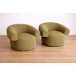 Pair of Swivel "Cloud" Lounge Chairs This striking pair of swivel lounge chairs represents the