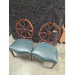 Pair of George III Style Wheelback Chairs A pair of George III style chairs featuring the iconic "