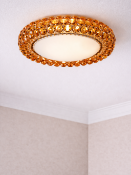 I-Lite Caboche-Inspired Amber Jewel Pendant This I-Lite Pendant Lamp is an unmistakable design