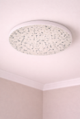 I-Lite Nordic Terrazzo Wall Sconce This I-Lite Wall Sconce features a minimalist, oversized circular