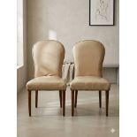 Pair of Cream Leather Side Chairs A pair of elegant side chairs upholstered in smooth cream leather,